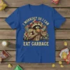 Funny I Workout So I Can Eat Garbage t-shirt with a muscular raccoon eating a burger next to gym equipment