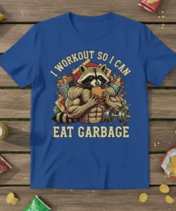 Funny I Workout So I Can Eat Garbage t-shirt with a muscular raccoon eating a burger next to gym equipment