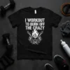 Black t-shirt with white text "I WORKOUT TO BURN OFF THE CRAZY" above a graphic of a barbell and flames