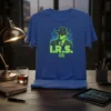I.R.S. text design with a man in a fedora and suit, stylized with circuit board elements on a blue t-shirt