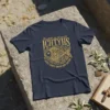 Dark navy t-shirt featuring a gold glitter Ichthys fish symbol with "ICHTYHS JESUS CHRIST SON OF GOD SAVIOR" text
