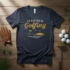 I'd Rather Be Golfing text with golf course graphic on a navy t-shirt