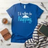 I'd Rather Be Napping quote on a blue t-shirt with cloud graphic and stars