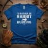 Blue t-shirt with white text "I'd Rather Be Rabbit Hunting" and a rabbit silhouette within crosshairs