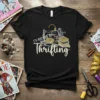 I'd Rather Be Thrifting t-shirt with sewing machine and fabric graphic, vintage style text