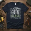 T-shirt design with text "I'd Rather Be At The Gun Range" featuring vintage firearms and target graphics