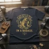 Graphic t-shirt with "If God Gives Us What He Thinks We Can Handle, He Must Think I'm a Badass" text