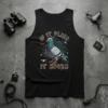 Tank top with "If It Flies It Spies" text and a pigeon graphic surrounded by tech elements like drones and