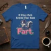 If They Talk Behind Your Back Fart quote on a blue t-shirt with a cartoon skunk wearing a hat