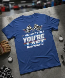 Blue t-shirt with "IF YOU AIN'T FIRST YOU'RE LAST" text and checkered flags graphic, suitable for racing fans