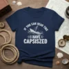 Funny sailing t-shirt with white text "If You Can Read This I Have Capsized" and a graphic of a boat