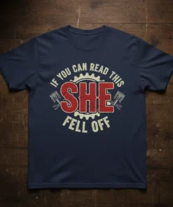 If You Can Read This She Fell Off quote on a navy blue t-shirt with piston and gear graphics