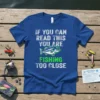 Blue t-shirt with white text "IF YOU CAN READ THIS YOU ARE" and green text "FISHING TOO CLOSE", featuring a