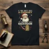 Funny Christmas T-Shirt with "If You Don't Have A Chimney I'm Coming In Your Backdoor" text and winking Santa graphic