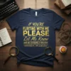 Navy t-shirt with gold glitter text "IF YOU'RE FLIRTING WITH ME PLEASE Let Me Know AND BE EXTREMELY SPECIFIC 'SERIOUSLY