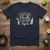 Navy t-shirt with "IF YOU'RE GOING to be salty AT LEAST BRING Tequila" text and graphics of a drink and