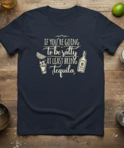 Navy t-shirt with "IF YOU'RE GOING to be salty AT LEAST BRING Tequila" text and graphics of a drink and