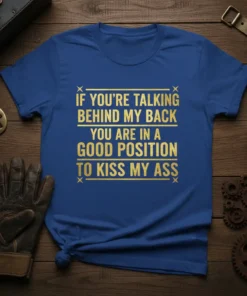 Royal blue t-shirt with gold glitter text: "IF YOU'RE TALKING BEHIND MY BACK YOU ARE IN A GOOD POSITION TO