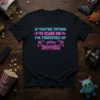 Neon text design on black t-shirt: "IF YOU'RE TRYING TO SCARE ME I'M TERRIFIED OF BOOBS" with ghost and umbrella