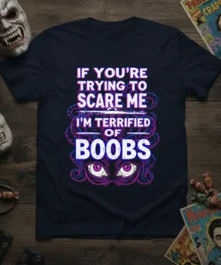 T-shirt with the bold text "IF YOU'RE TRYING TO SCARE ME I'M TERRIFIED OF BOOBS" in purple and white, surrounded