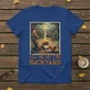 I'll Be In The Backyard t-shirt design showing a cozy backyard scene with a fire pit, Adirondack chairs, and a