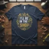 I'll Be In The Shop t-shirt design with tools, gears, and hammers surrounding the quote