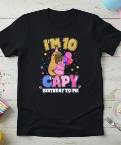 Capybara wearing a party hat holding a cake and balloons, text says "I'm 10 Capy Birthday To Me" on a