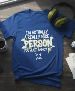 I'm Actually A Really Nice Person You Just Annoy Me text design with distressed elements and an angry face graphic