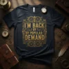 Black t-shirt with gold glitter "I'm Back By Popular Demand" text in ornate frame