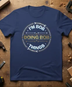 T-shirt with "I'm Bob Doing Bob Things" text in a circular design with wrenches and stars, navy blue shirt