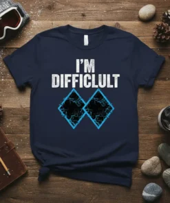 Navy t-shirt with white distressed text "I'M DIFFICULULT" above two blue diamond ski slope markers