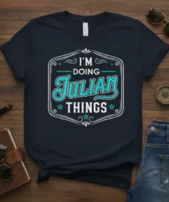 Navy t-shirt with "I'M DOING Julian THINGS" text in a decorative frame, featuring the name Julian in a prominent teal