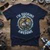 I'm Ducking Awesome robot duck design with text, circular frame, and cracked texture on navy t-shirt