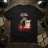 I'm fine It's not my blood quote on a black t-shirt with a skeleton hand writing blood on a scroll