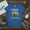 Blue t-shirt with "I'm Going Outside So If Anyone Asks I'm Outstanding" text and mountain graphic