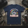 I'm Gonna Be The Whole Problem quote on a navy t-shirt with a cannabis leaf, rainbow, and flames graphic