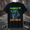 Black t-shirt with "I'M GONNA BE THE WHOLE PROBLEM" text and a cyborg raccoon holding a bomb, surrounded by money