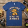 I'm Into Fitness Fit'ness Taco In My Mouth text with cartoon tacos flexing muscles and holding dumbbells, on a blue