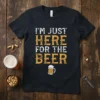I'm Just Here For The Beer quote on a black t-shirt with a beer mug graphic