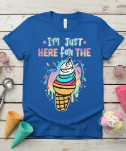 Blue t-shirt with colorful text "I'm Just Here For The" above a graphic of a multi-colored ice cream cone with