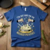 Blue t-shirt with "I'm Just Here For The Mashed Potatoes" text and graphic of hands whisking mashed potatoes