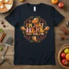 I'm Just Here For The Pie text with pumpkin pie slices graphic on a navy t-shirt