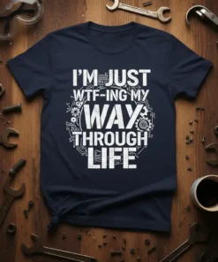I'm Just WTF-ing My Way Through Life text design with circuit board and gear graphics on a navy t-shirt