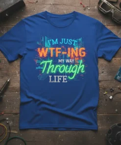 I'm Just WTF-ing My Way Through LIFE text design with glitch art and neon city background on a blue t-shirt