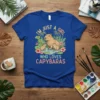 T-shirt with the text "I'm Just A Girl Who Loves Capybaras" featuring a mother capybara with two babies in a