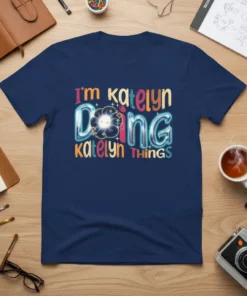 T-shirt design with colorful text that reads "i'm katelyn Doing katelyn THINGS" and a floral graphic