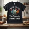 Black t-shirt with white text "I RAISE CHICKENS I'm Literally A CHICKEN TENDER" and graphics of three chickens