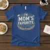 I'm Mom's Favorite (she told me not to tell you) quote on a royal blue t-shirt, featuring gold distressed typography