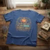 I'm My Mother In Laws Favorite Child text design with ornate gold border and heart graphic on a blue t-shirt