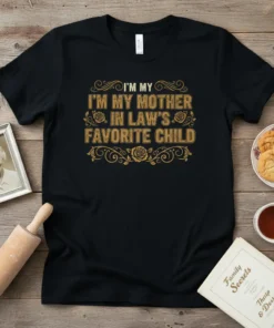 I'm My Mother In Law's Favorite Child quote in decorative gold font on a black t-shirt